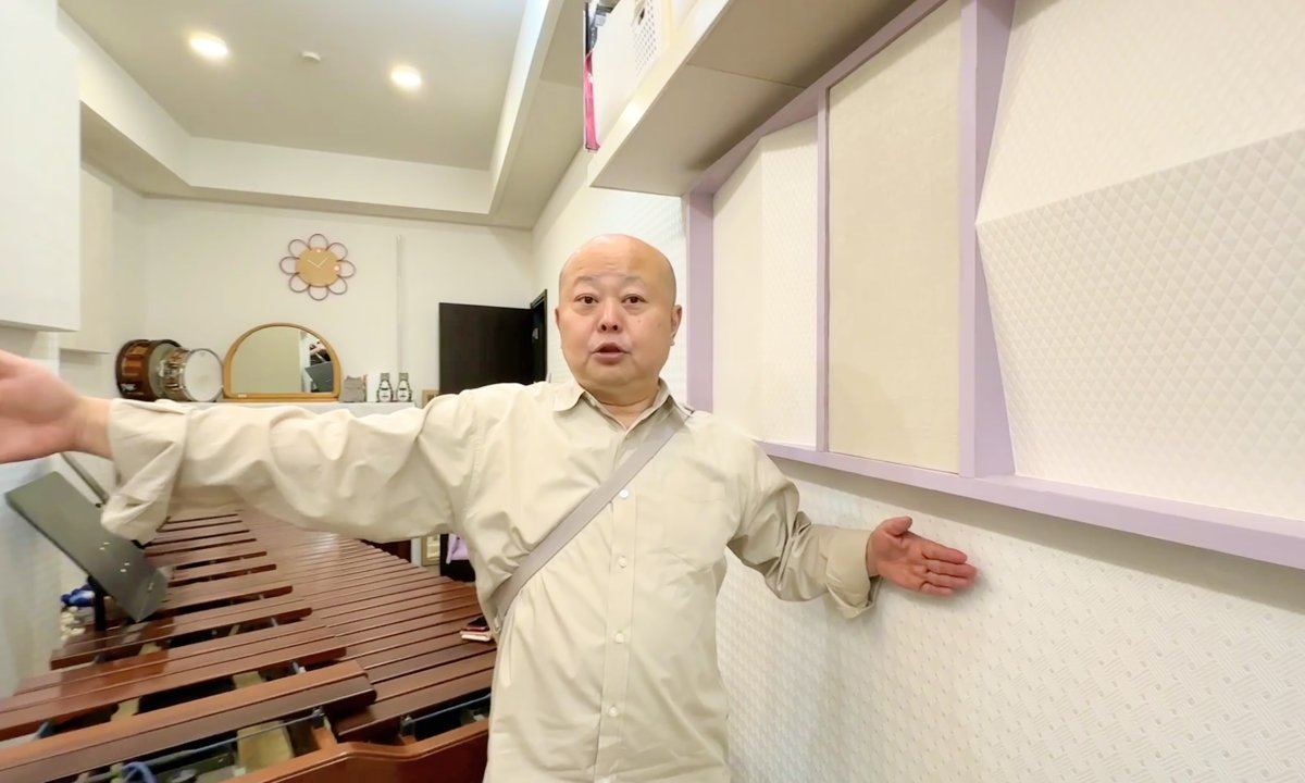増床した範囲を説明する田中代表